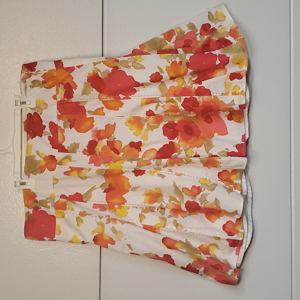 Covington Colorful Pleated Skirt. Floral patterned s with pink, orange, red